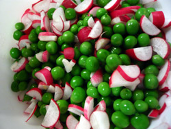 Peas and radishes in a bowl