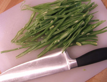 Sliced beans with knife